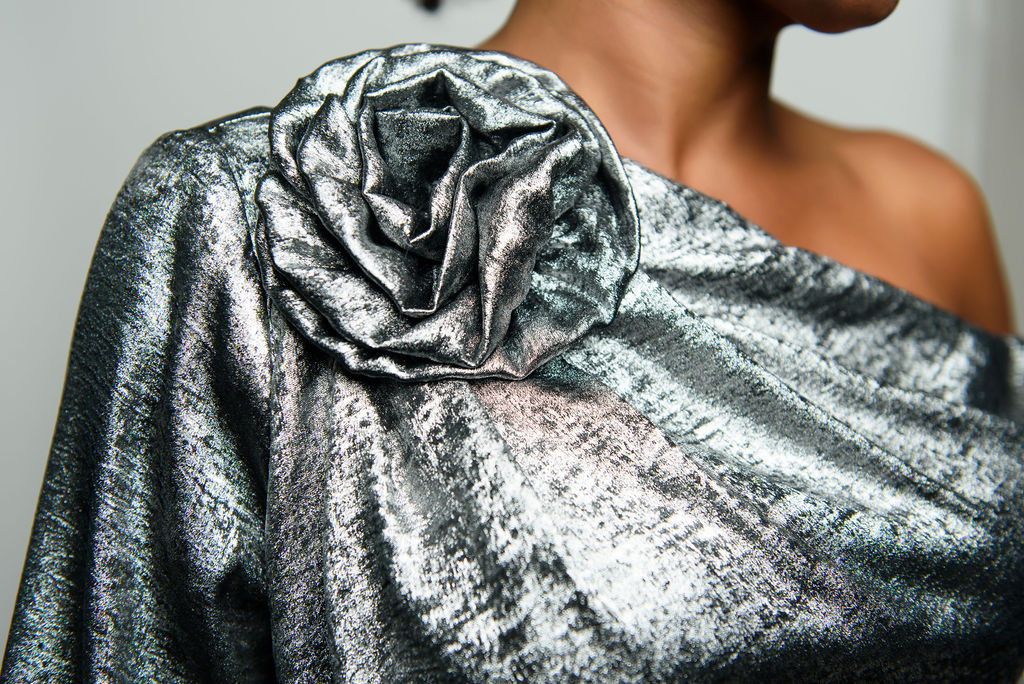 Metallic Rosette Slant Shoulder Top