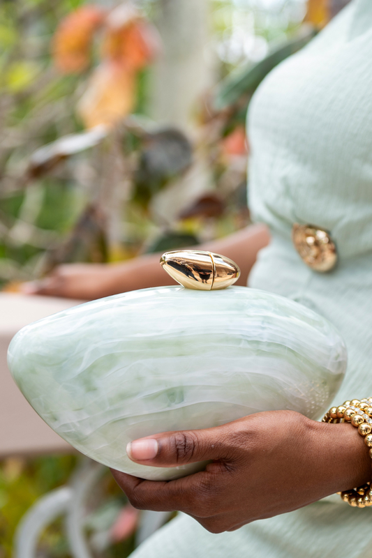 Egg Shaped Shine Clutch Bag